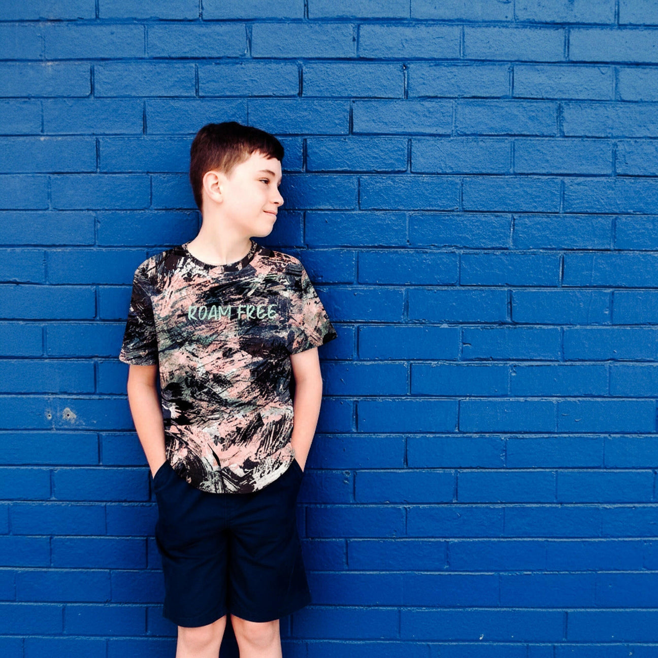 Boy wearing colorful boy tee by House Panther