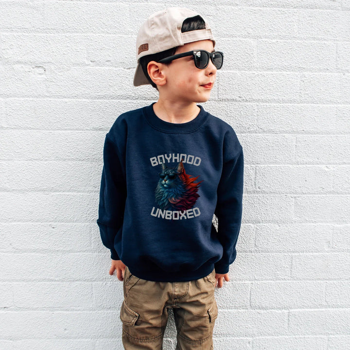 Child wearing a navy boyhood, unboxed  House Panther sweatshirt with text and graphics, standing against a white brick wall.